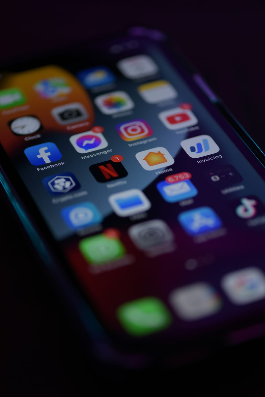 A close-up of a smartphone screen showing bright, sharp app icons